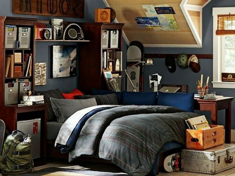 Gli adolescenti progettano la stanza del ragazzo con il colore della parete scura sovraccaricato accogliente Stanza per adolescenti che allestisce un'accogliente ingombro?